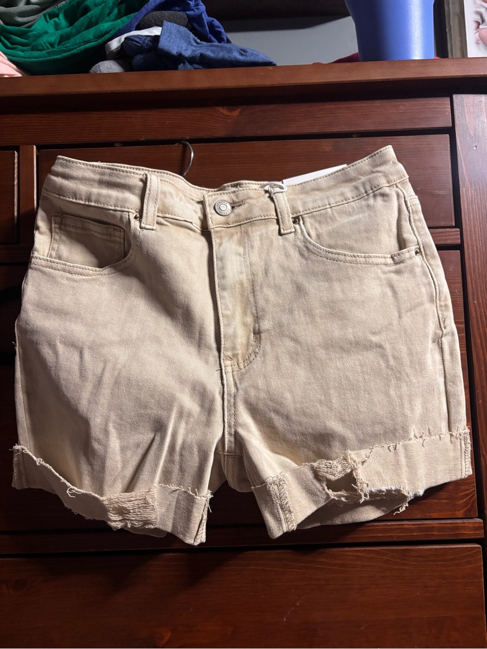 Zenana. High-Rise Beige Distressed Denim Jean Shorts. Soft with slight stretch.